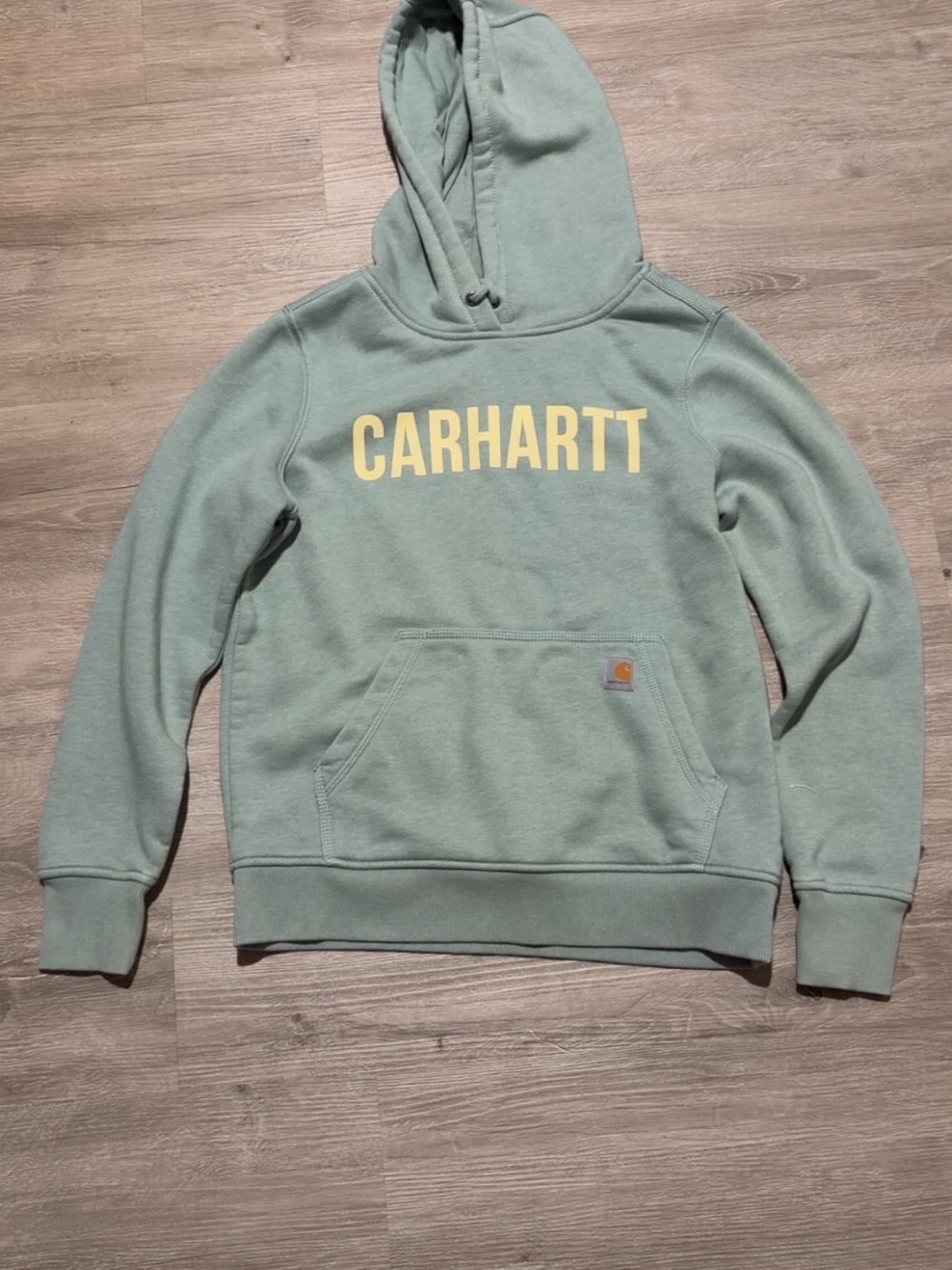 Woman’s Carhartt Sage Green Hoodie with Yellow Logo